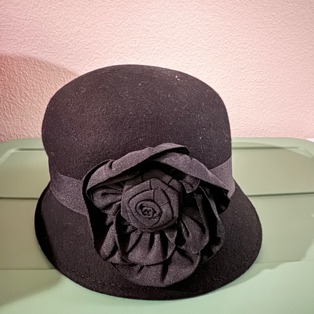 Black felt hat with flower bow